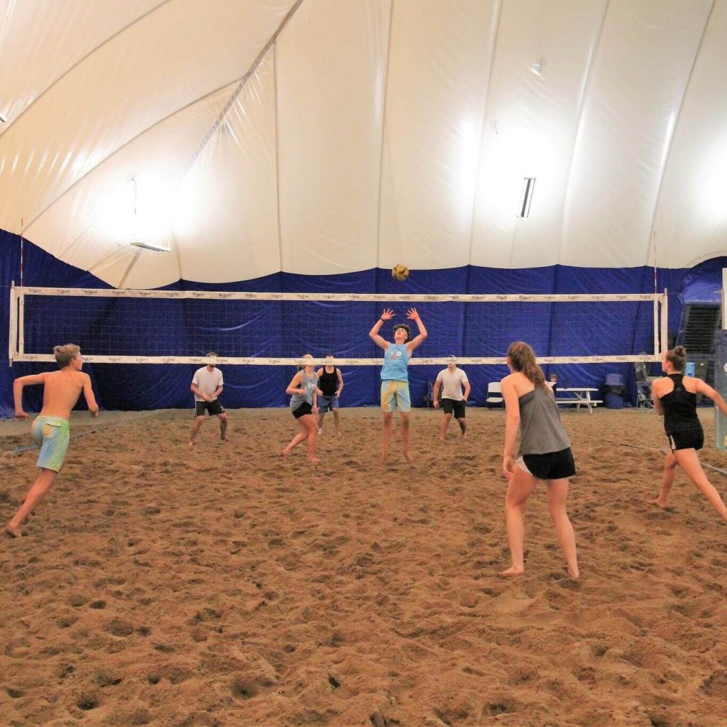 Indoor sand volleybal courts at Volleyball Beach Ozark