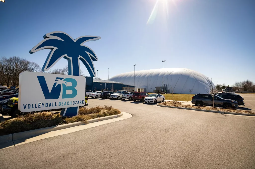 A view of Volleyball Beach Ozark from the parking lot